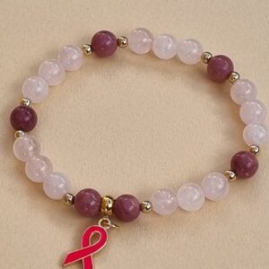 Découvrez le bracelet en Quartz rose et rhodonite, qui favorise l'amour et l'harmonie. De plus, il apaise les émotions et renforce la confiance en soi. N'attendez plus pour ajouter ce bijou à votre collection !