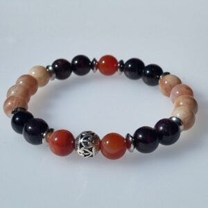 Découvrez notre bracelet énergisant en pierre de soleil, cornaline et grenat, conçu pour harmoniser votre énergie et embellir votre poignet. Grâce à ses pierres naturelles, ce bracelet ne se contente pas d'être un accessoire de mode, il favorise également le bien-être et la vitalité. Plongez dans l'univers des pierres précieuses et laissez-vous séduire par les bienfaits de ce bijou unique.