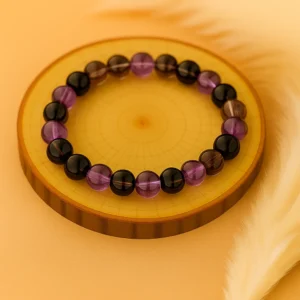 Bracelet anti-addiction en pierres naturelles d’onyx, améthyste et quartz fumé, symbole de confiance et d’équilibre.