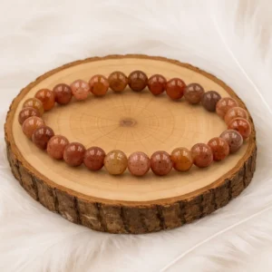 Bracelet en aventurine rouge naturelle sur rondin en bois, perles rondes