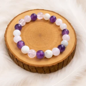 Bracelet soutien au deuil en pierres naturelles (pierre de lune, quartz rose et améthyste) sur rondin en bois