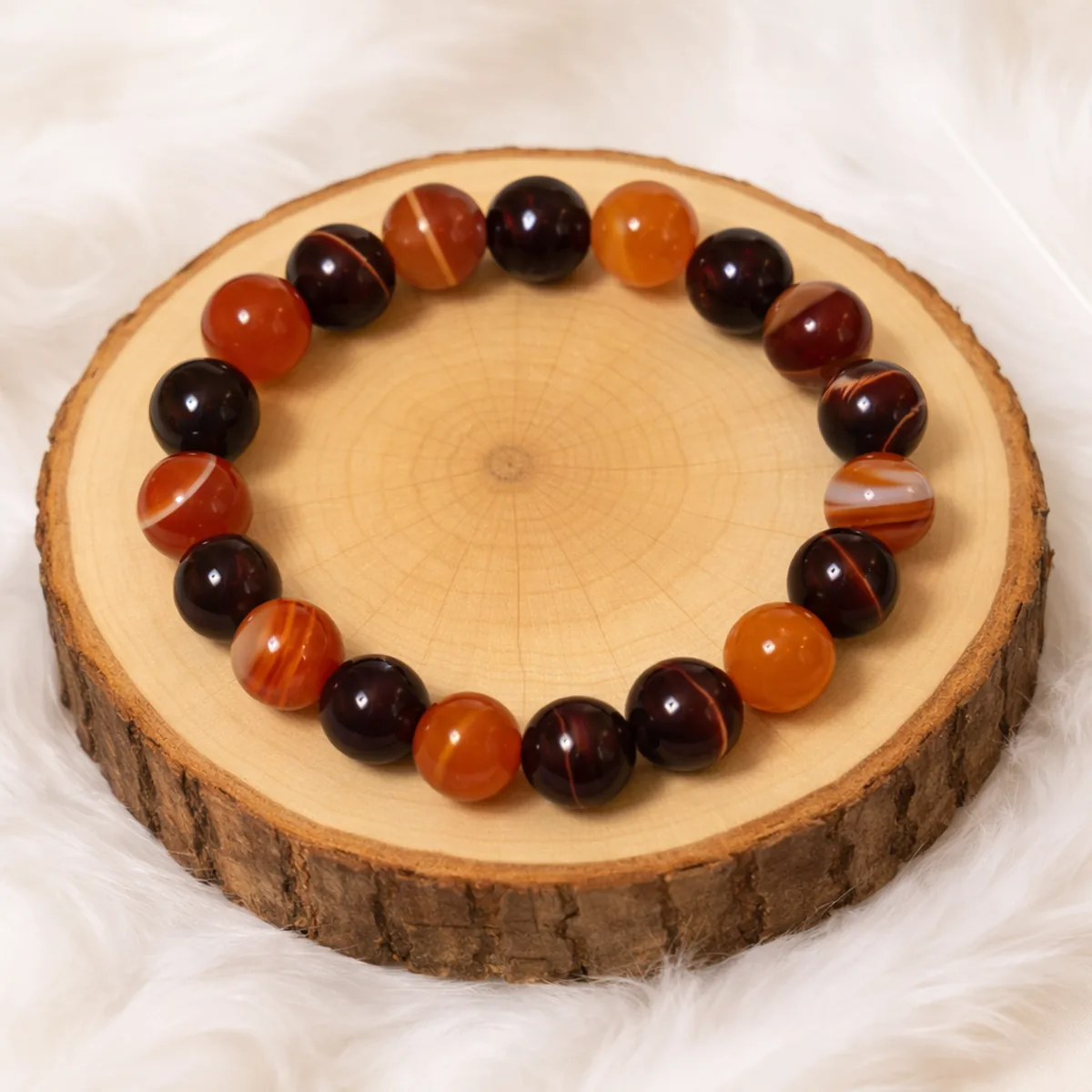 Bracelet confiance en soi en cornaline et œil de taureau sur rondin en bois
